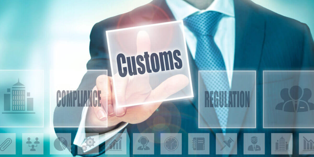 man in suite pressing button of customs Clearance