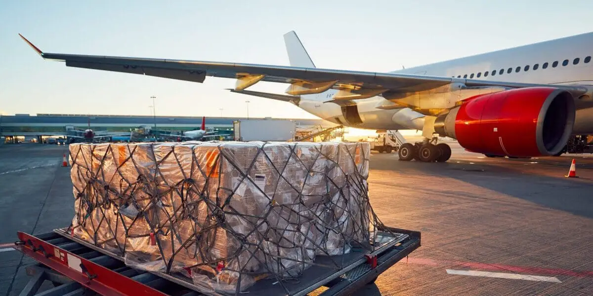 Air Freight being loaded in to plan on a sunny evening
