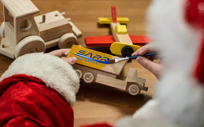 Christmas Logistics Santa Painting a Truck SARR Logistics UK